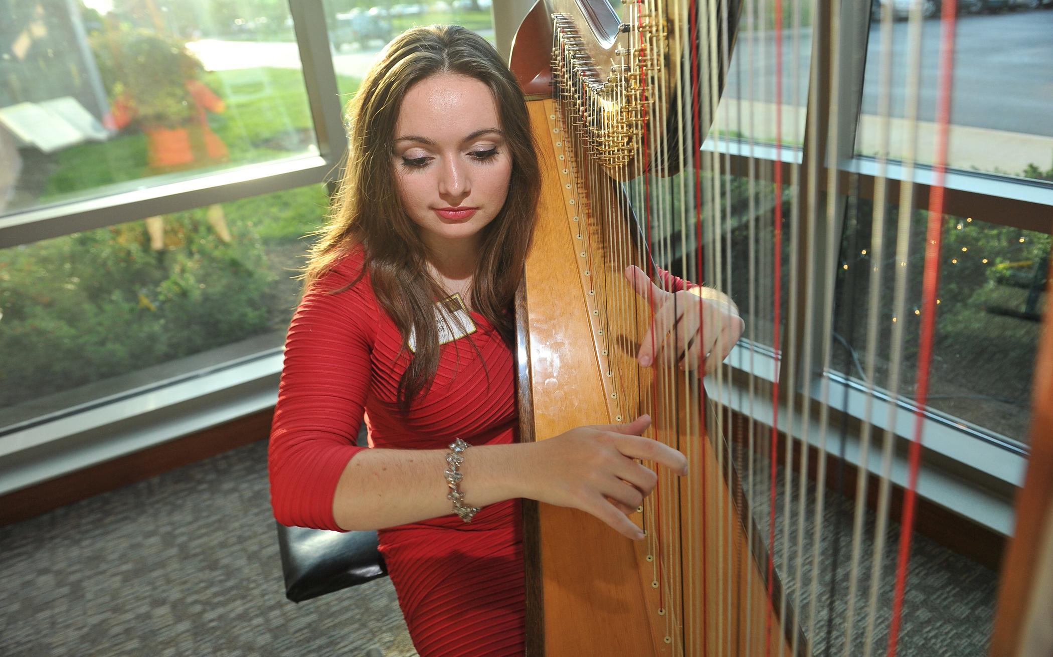 student harpist performing 