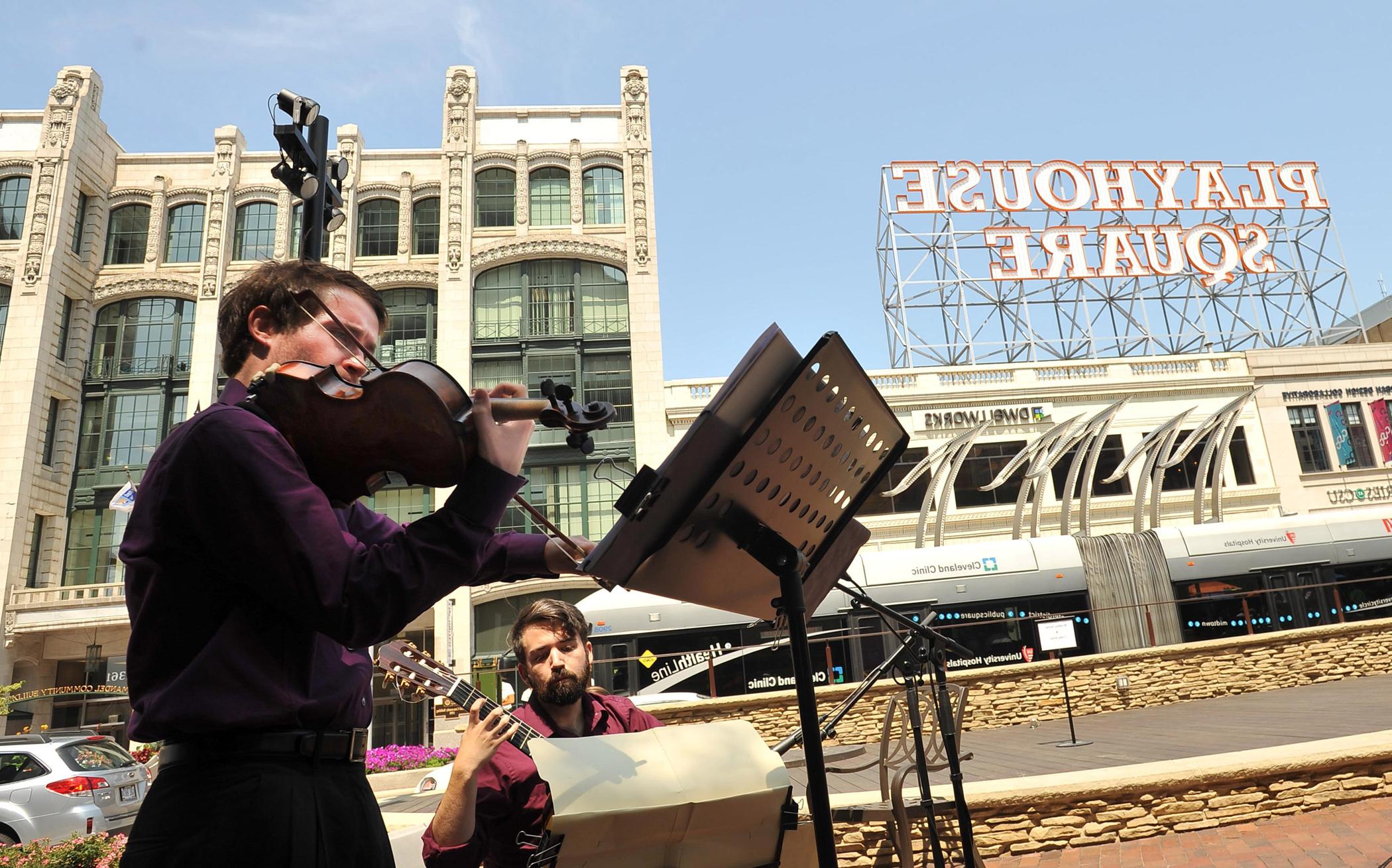 Music students perform downtown outside of playhouse square 